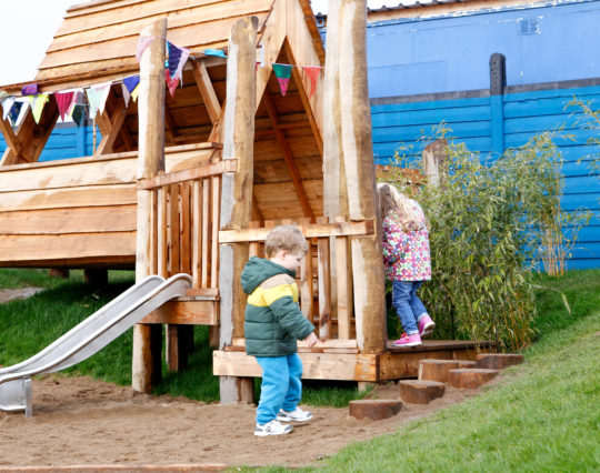 Play equipment on a slope