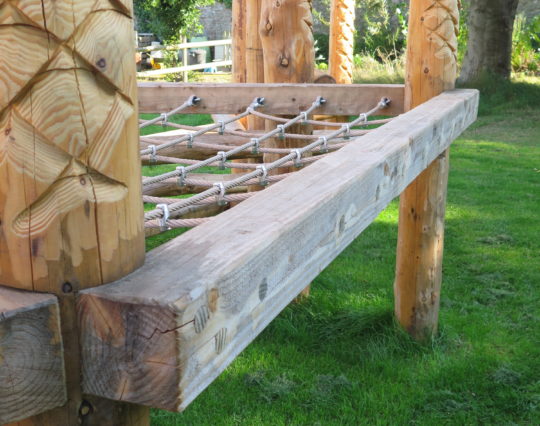 Timber climbing frame with nets